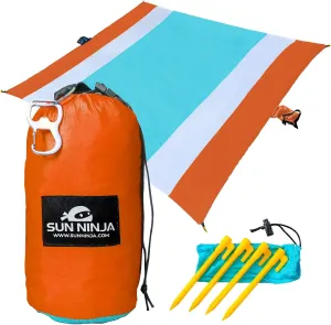SUN NINJA Sand-Free Beach Blanket - 10ft X 9ft Lightweight Outdoor Blanket with Storage, Bottle Opener, Carabiner, Shoulder Strap, Corner Sand Pockets & 4 Stakes